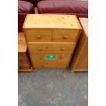 A PINE CHEST OF TWO SHORT AND THREE LONG DRAWERS 24.5" WIDE