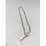 A SILVER T BAR NECKLACE