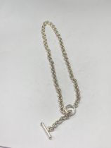 A SILVER T BAR NECKLACE