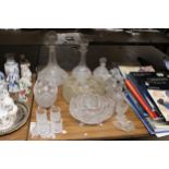 A QUANTITY OF GLASSWARE TO INCLUDE DECANTERS, BOWLS, BELLS, GLASSES, ETC
