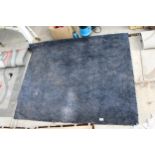 A MODERN BLUE RUG