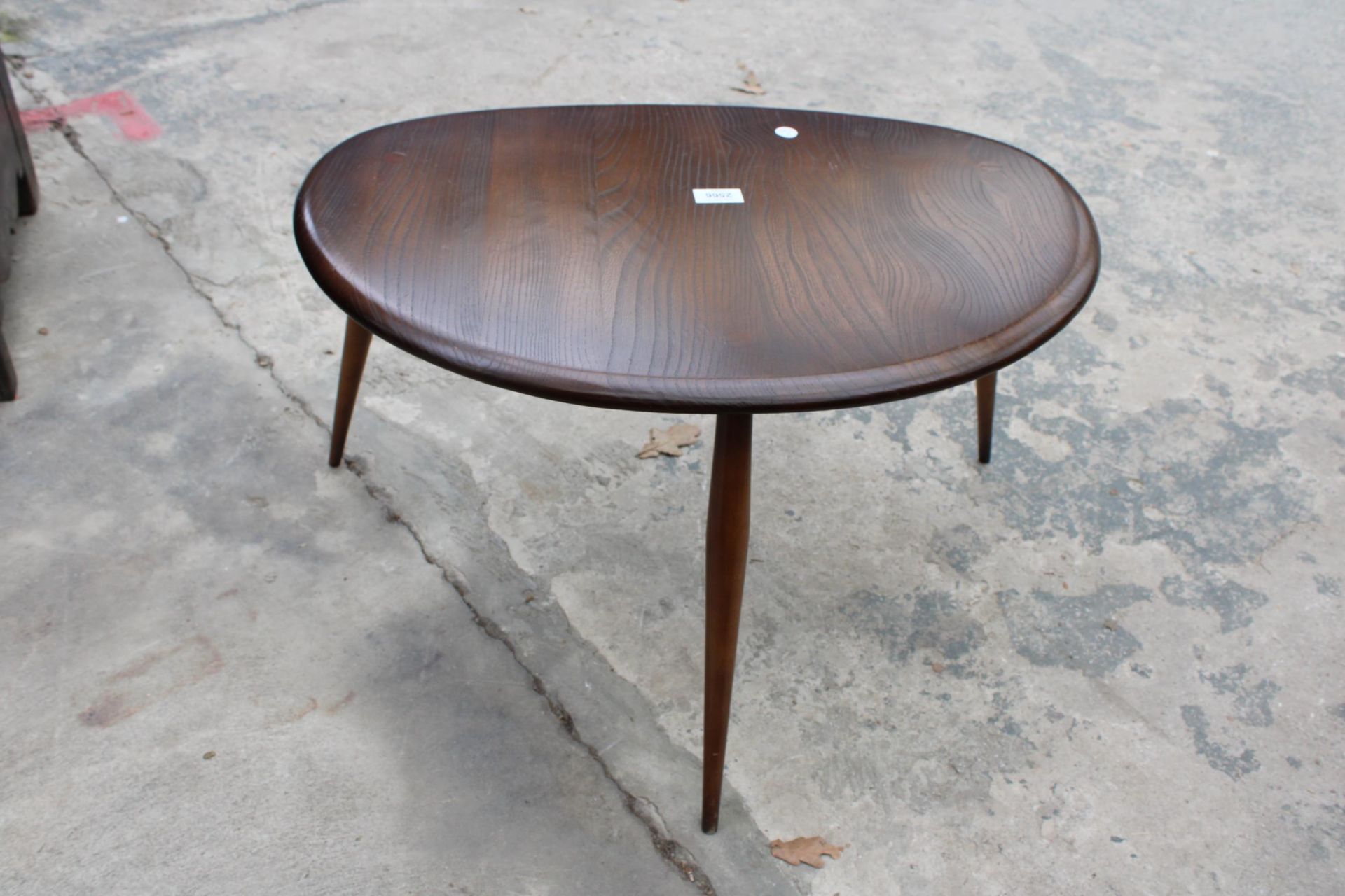 AN ERCOL PEBBLE COFFEE TABLE