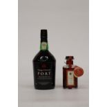TWO BOTTLES OF VINTAGE CHARACTER PORT TO INCLUDE A 70CL AND A 20CL