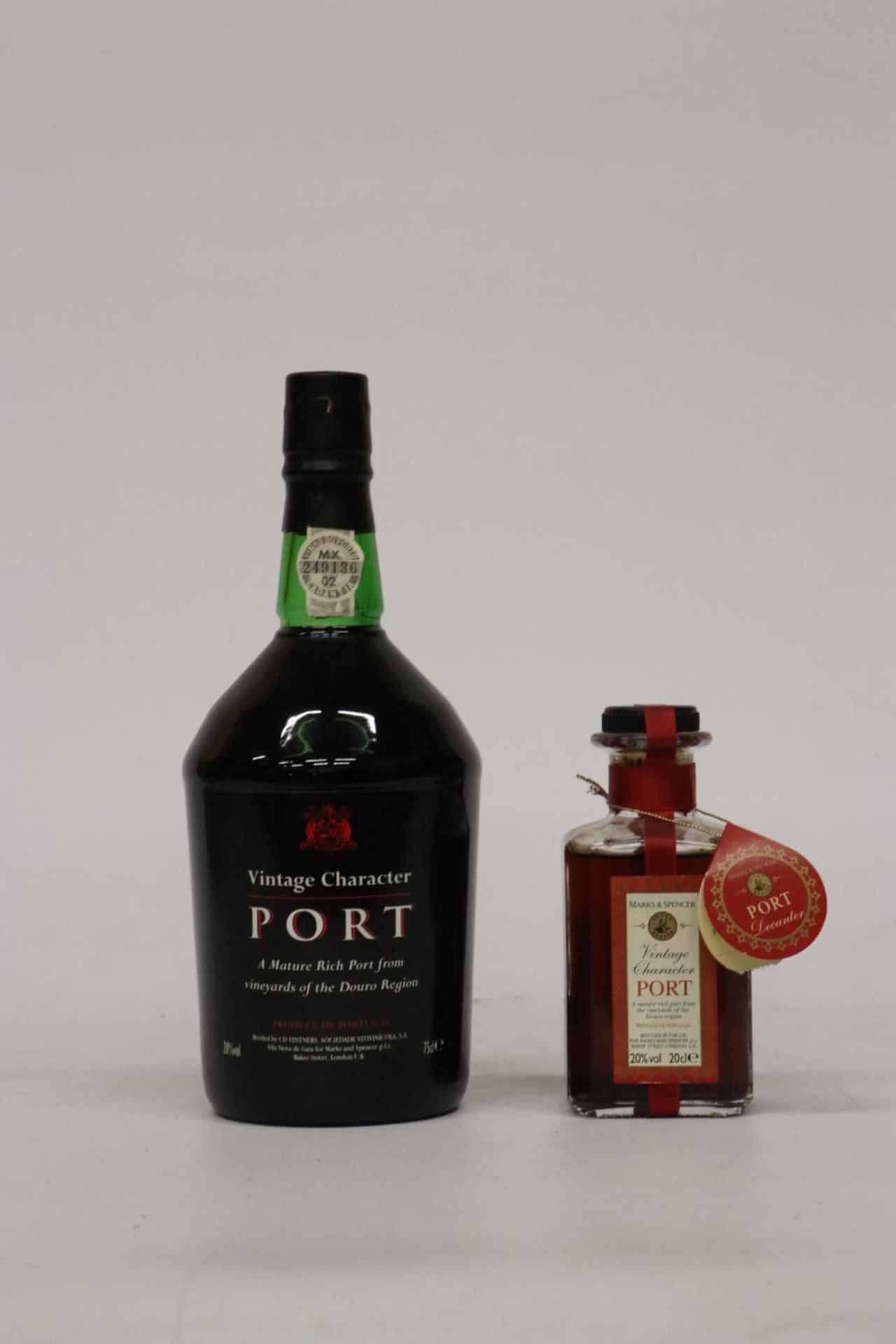 TWO BOTTLES OF VINTAGE CHARACTER PORT TO INCLUDE A 70CL AND A 20CL