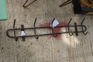 A METAL FIVE SECTION COAT RACK