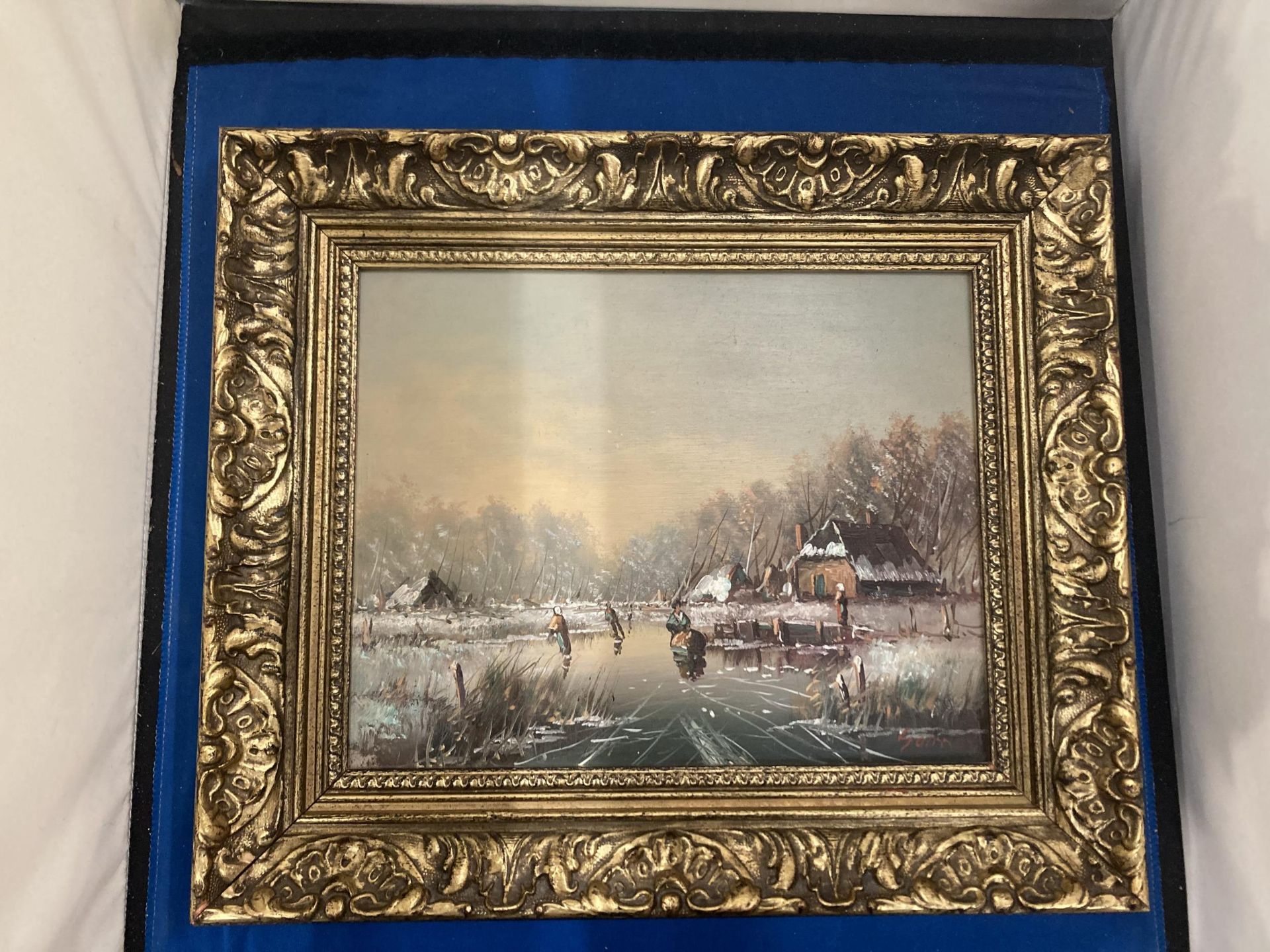 A GILT FRAMED OIL ON BOARD OF AN ORIENTAL SCENE SIGNED TO LOWER RIGHT CORNER