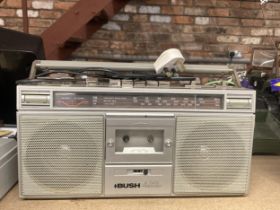 A VINTAGE BUSH RADIO CASSETTE PLAYER