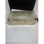 A LARGE HALLMARKED BIRMINGHAM SILVER CIGARETTE BOX ENGRAVED TO THE LID WITH WOOD LINING