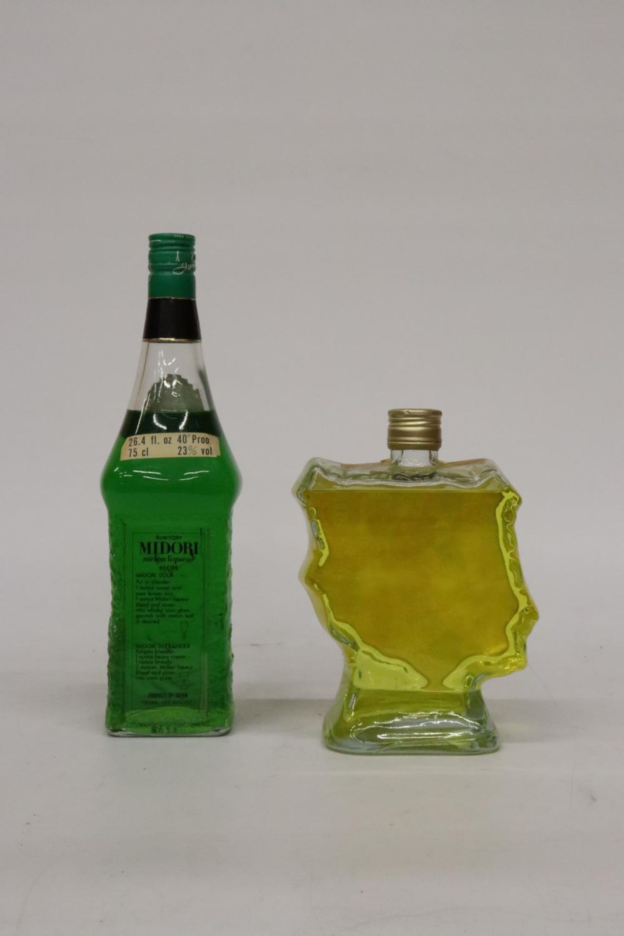 TWO BOTTLES OF LIQUOR TO INCLUDE A MAP OF SPAIN BANANA LIQUEUR AND SUNTORY MIDORI MELON LIQUEUR - Image 2 of 3