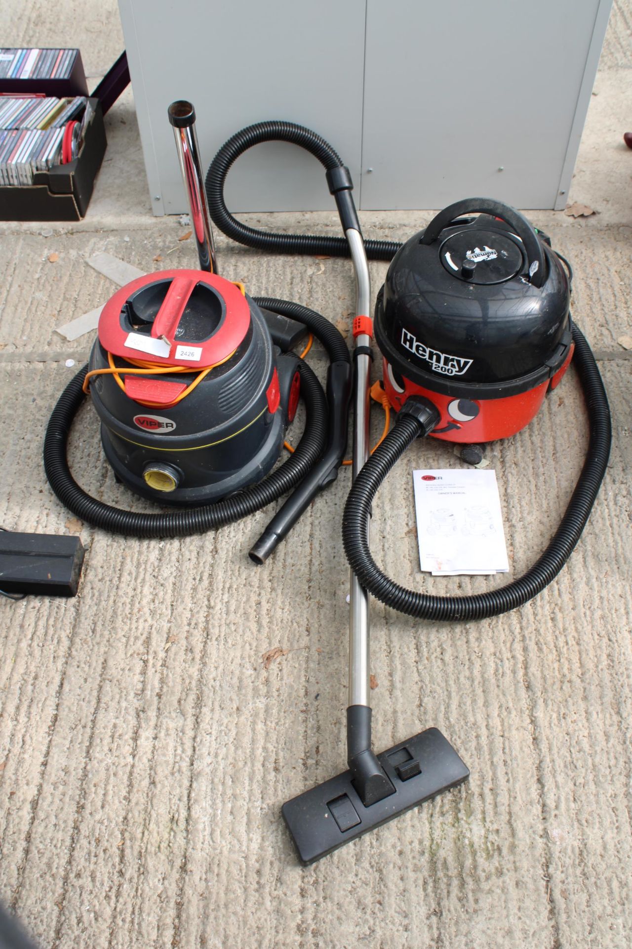 TWO VACUUM CLEANERSS TO INCLUDE A VIPER AND A HENRY