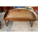 A GEORGIAN STYLE MAHOGANY COFFEE TABLE IN THE FORM OF A BUTLERS TRAY FULLY OPENED, 64" X 43"