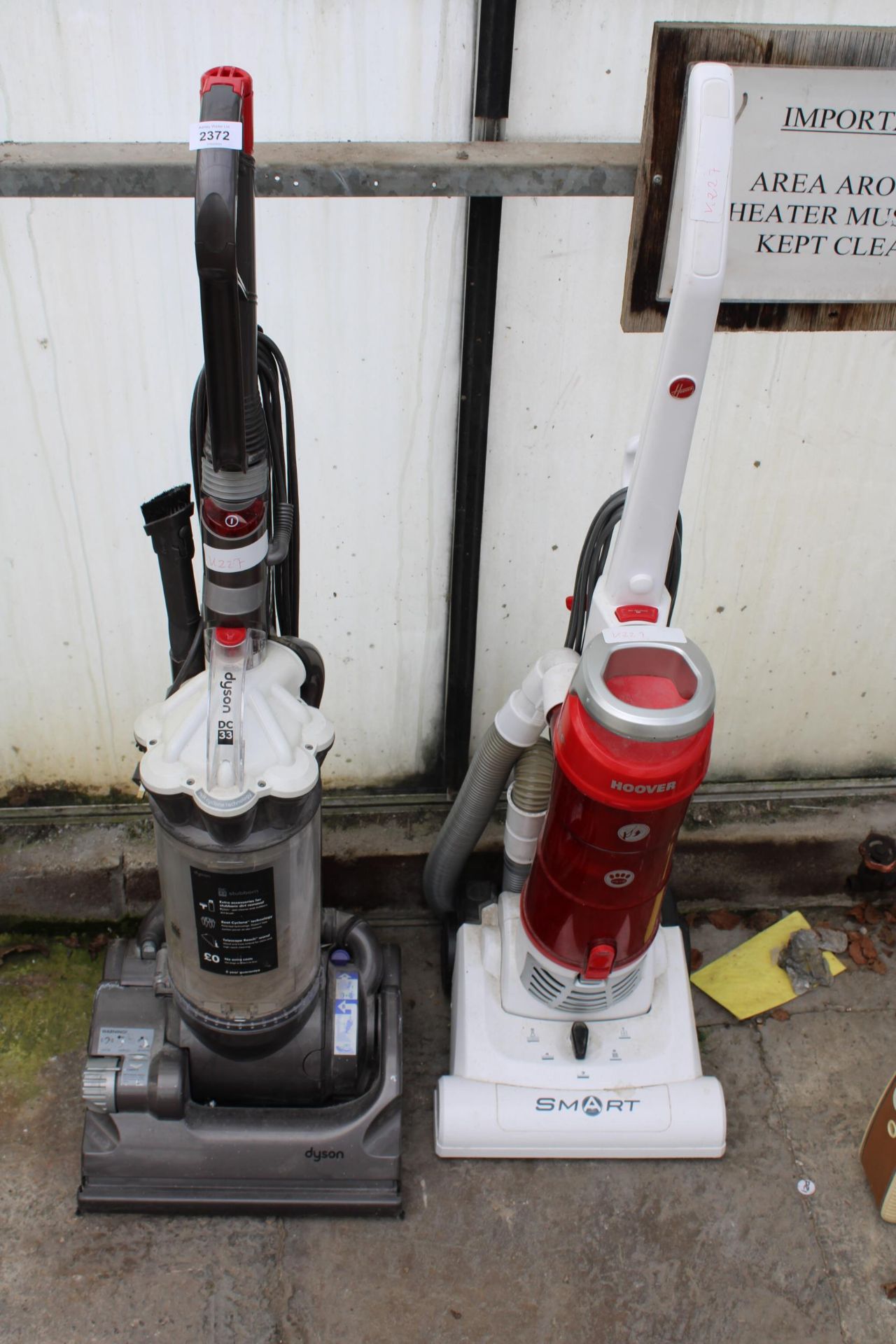 TWO VACUUM CLEANERS TO INCLUDE A DYSON DC33 AND A SMART HOOVER