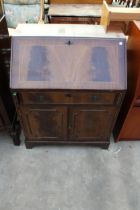 A REPRODUCTION MAHOGANY AND CROSSBANDED BUREAU WITH FITTED INTERIOR 29" WIDE