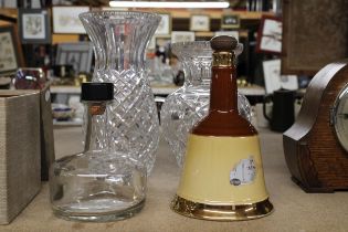 A MIXED LOT TO INCLUDE TWO GLASS VASES, A GLASS DECANTER PLUS A WADE BELL'S SCOTCH WHISKY DECANTER