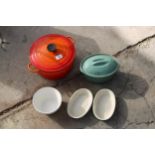 A LE CREUSET PAN AND FOUR CERAMIC COOKING DISHES