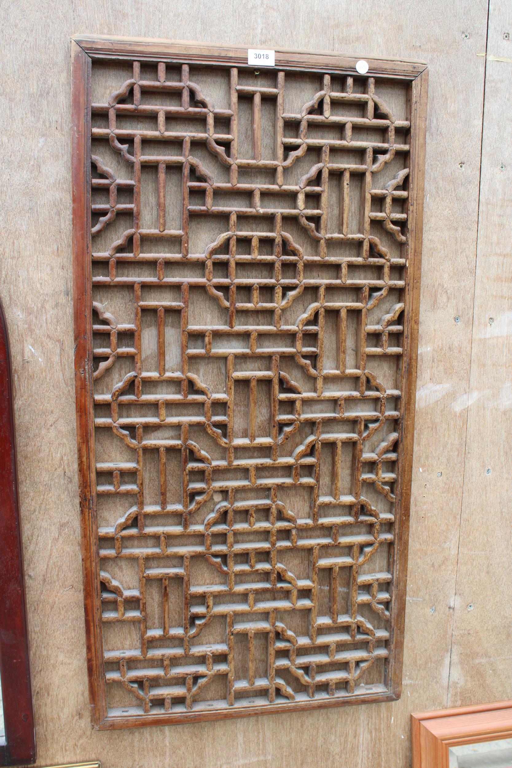 AN ORIENTAL HARDWOOD PANEL 41" X 21"