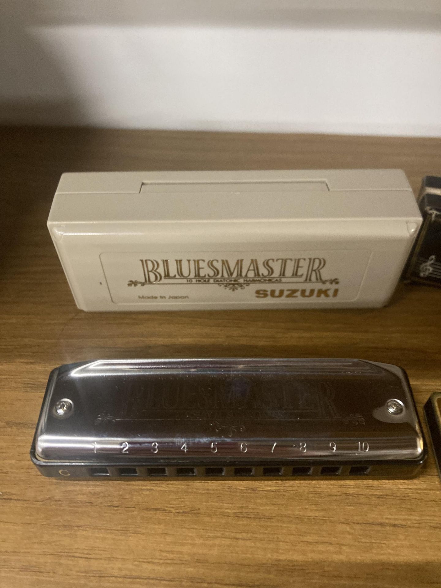 TWO HARMONICAS TO INCLUDE A SUZUKI BLUESMASTER IN KEY 'C' AND A FRONTIER HARP HARMONICA GOLD - Image 2 of 3