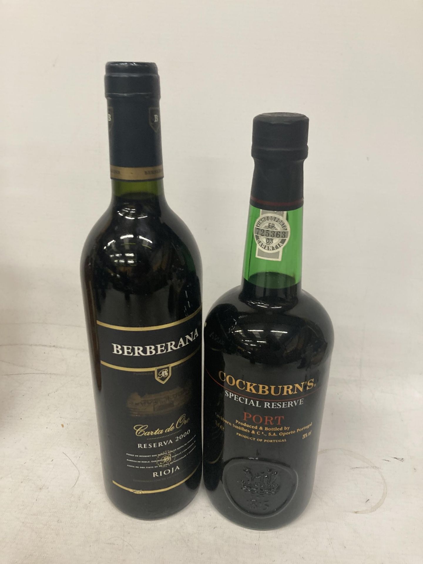 TWO BOTTLES TO INCLUDE A COCKBURNS SPECIAL RESERVE PORT AND A BERBERANA RESERVA 2000 RIOJA