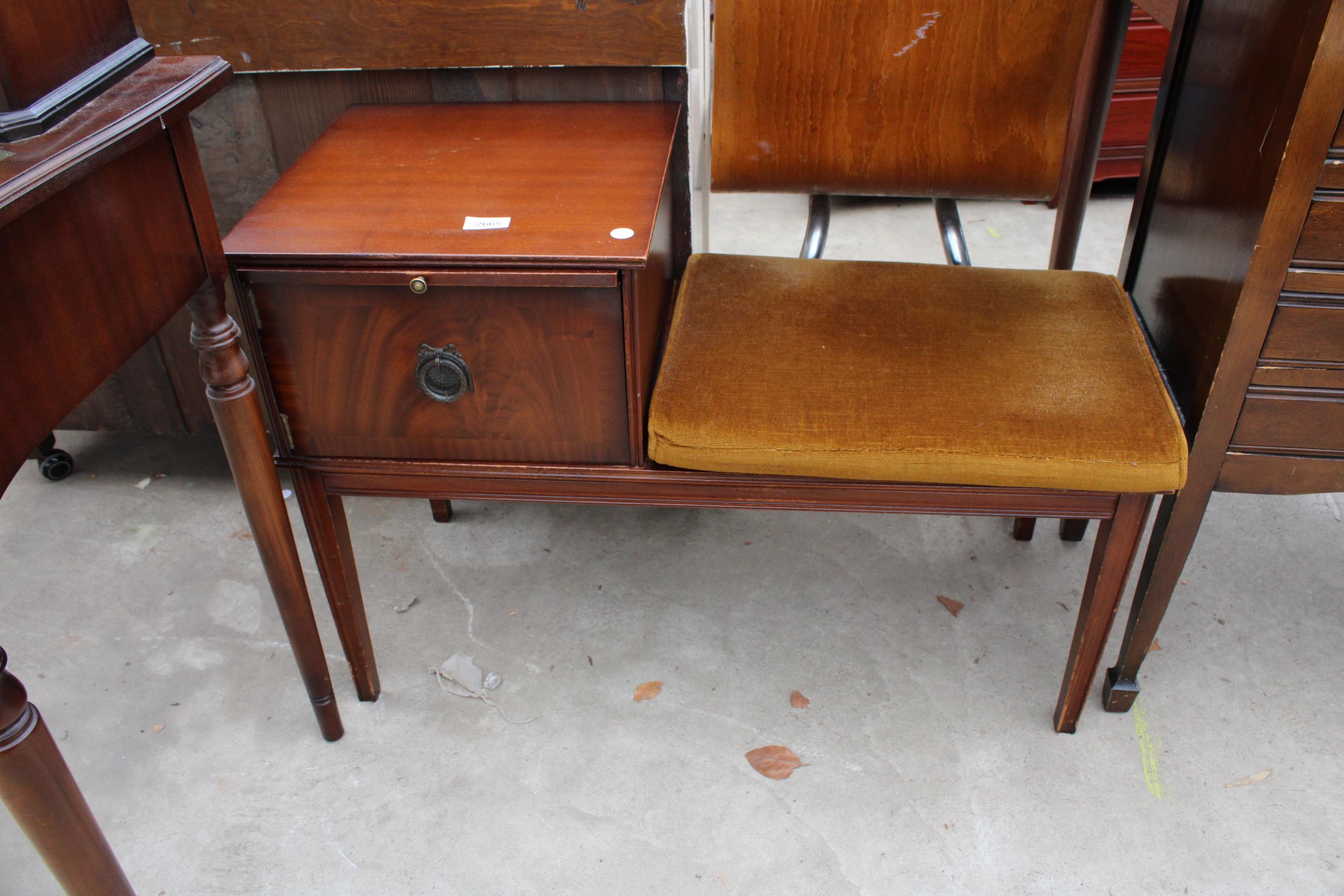 A MAHOGANY 'CHIPPY' TELEPHONE TABLE/SEAT