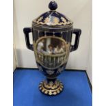 A ROYAL LIMOGES TWIN HANDLED VASE IN BLUE AND GOLD WITH LADIES ON A BALCONY DECORATION HEIGHT 35CM
