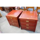 A PAIR OF MODERN HARDWOOD BEDSIDE CHESTS ENCLOSING THREE DRAWERS WITH BRASS HANDLES