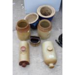 AN ASSORTMENT OF STONEWARE VESSELS AND GLAZED PLANT POTS