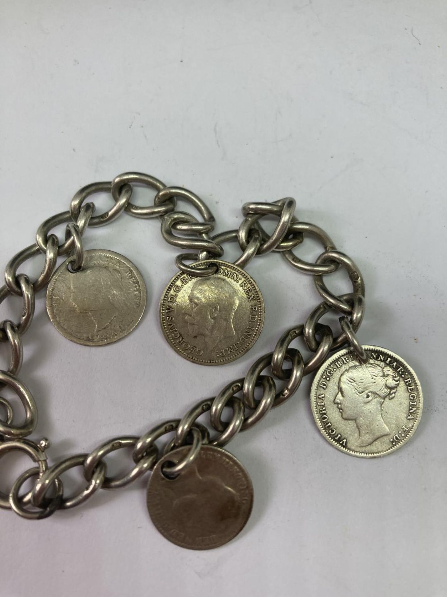 A SILVER COIN CHARM BRACELET - Image 2 of 3