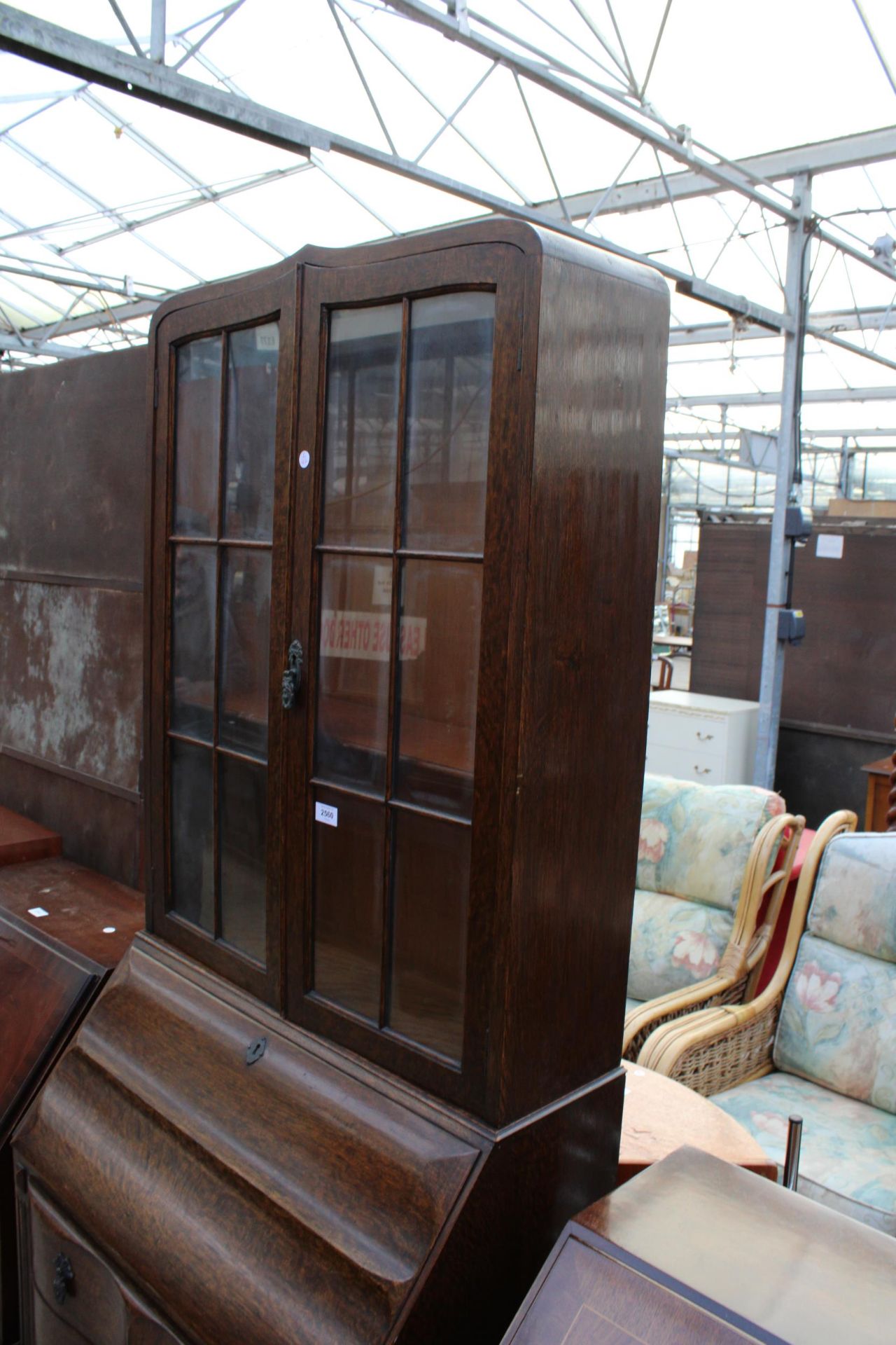 A EARLY 20TH CENTURY OAK SERPENTINE FRONTED BUREAU BOOKCASE WITH RETRACTABLE FITTED INTERIOR 29" - Image 3 of 6