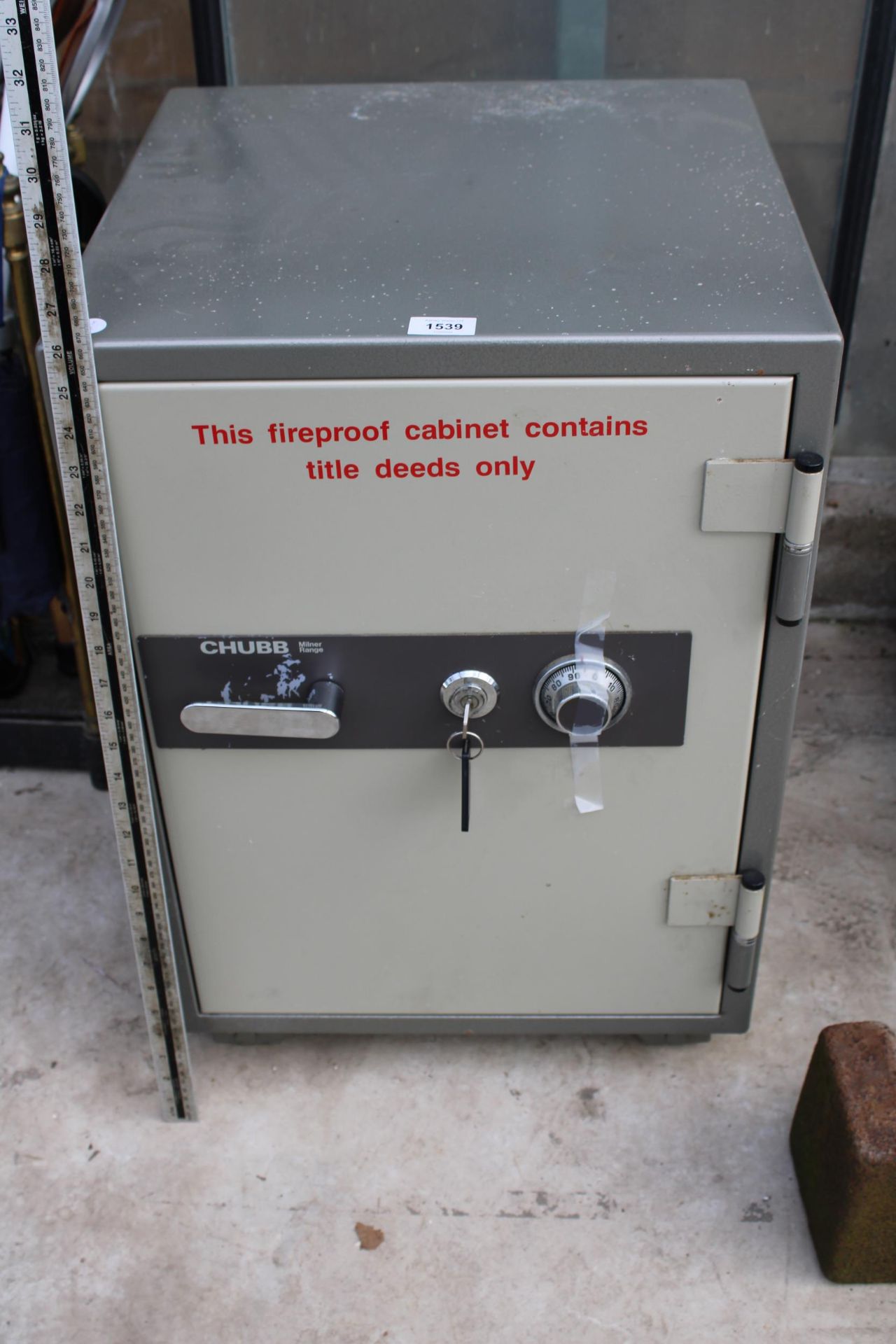 A CHUBB FIREPROOF SAFE COMPLETE WITH KEY