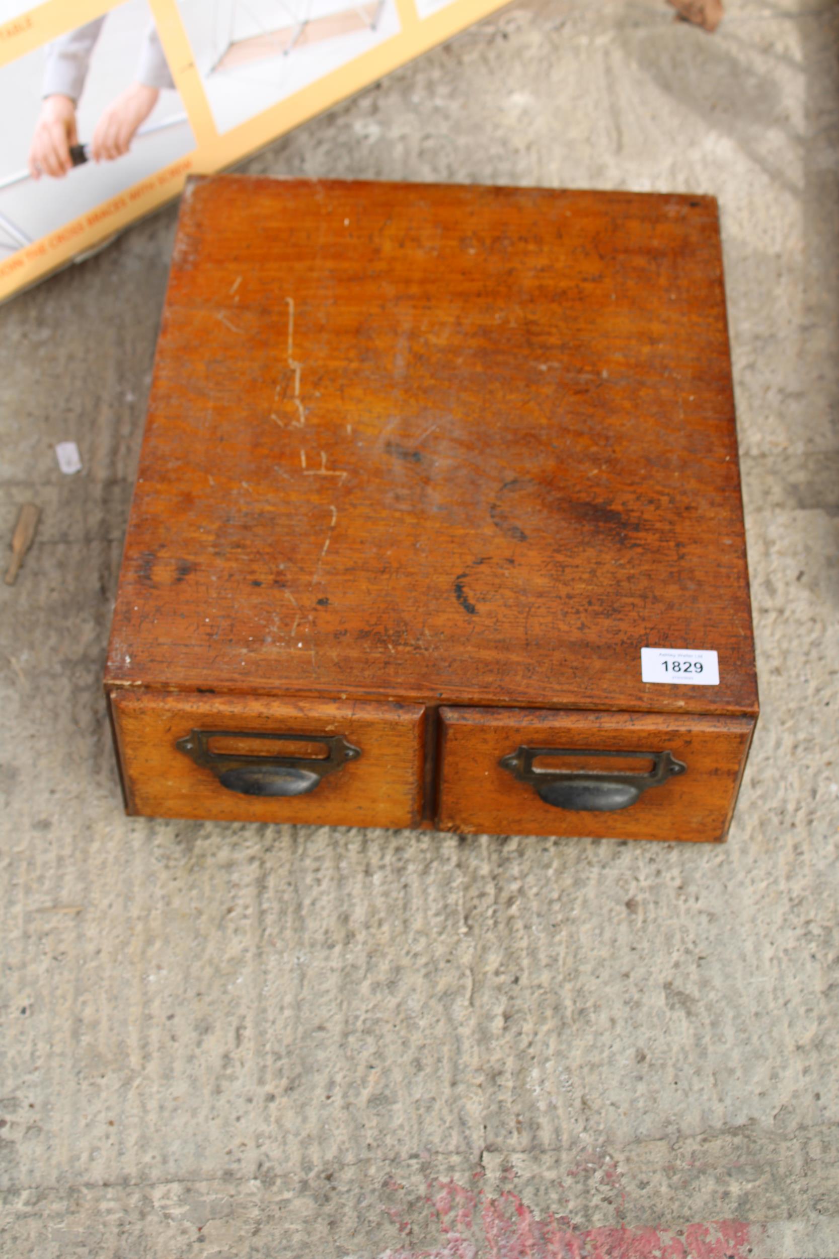 A TWO DRAWER VINTAGE OAK INDEX CABINET