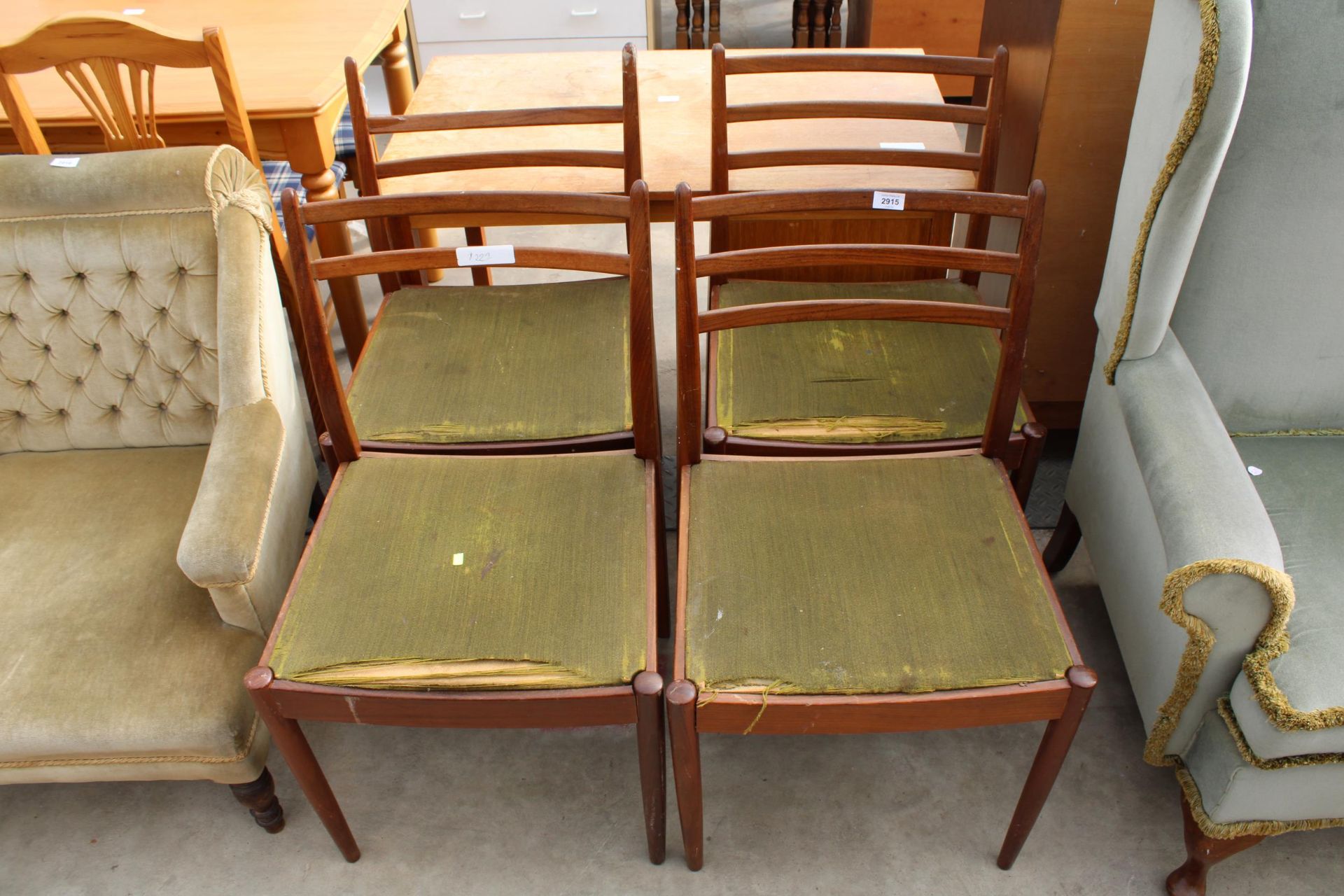 A SET OF FOUR RETRO TEAK G PLAN E GOMME DINING CHAIRS A/F