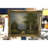 A WOODLAND SCENE OIL PAINTING IN AN ORNATE FRAME