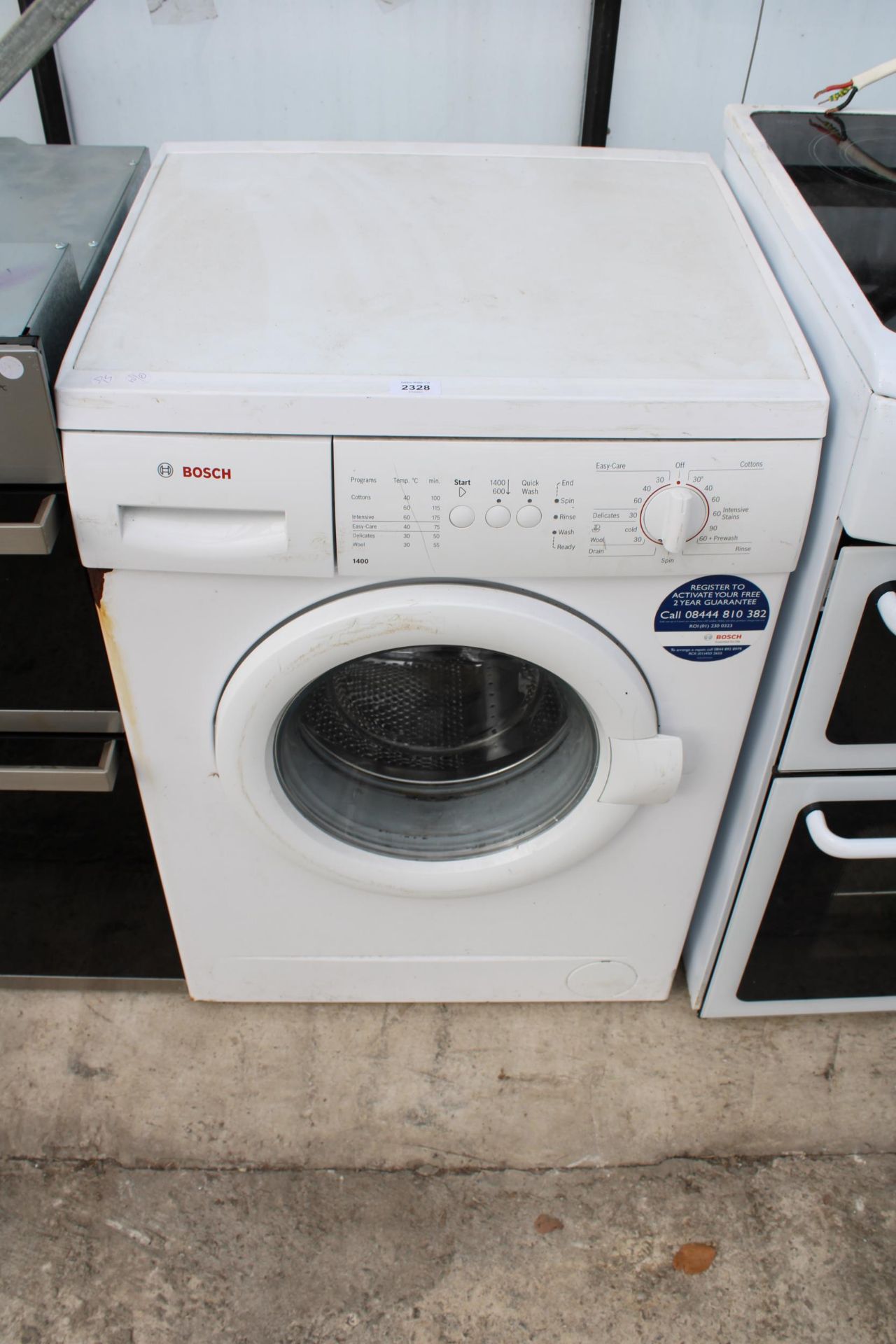 A WHITE BOSCH WASHING MACHINE