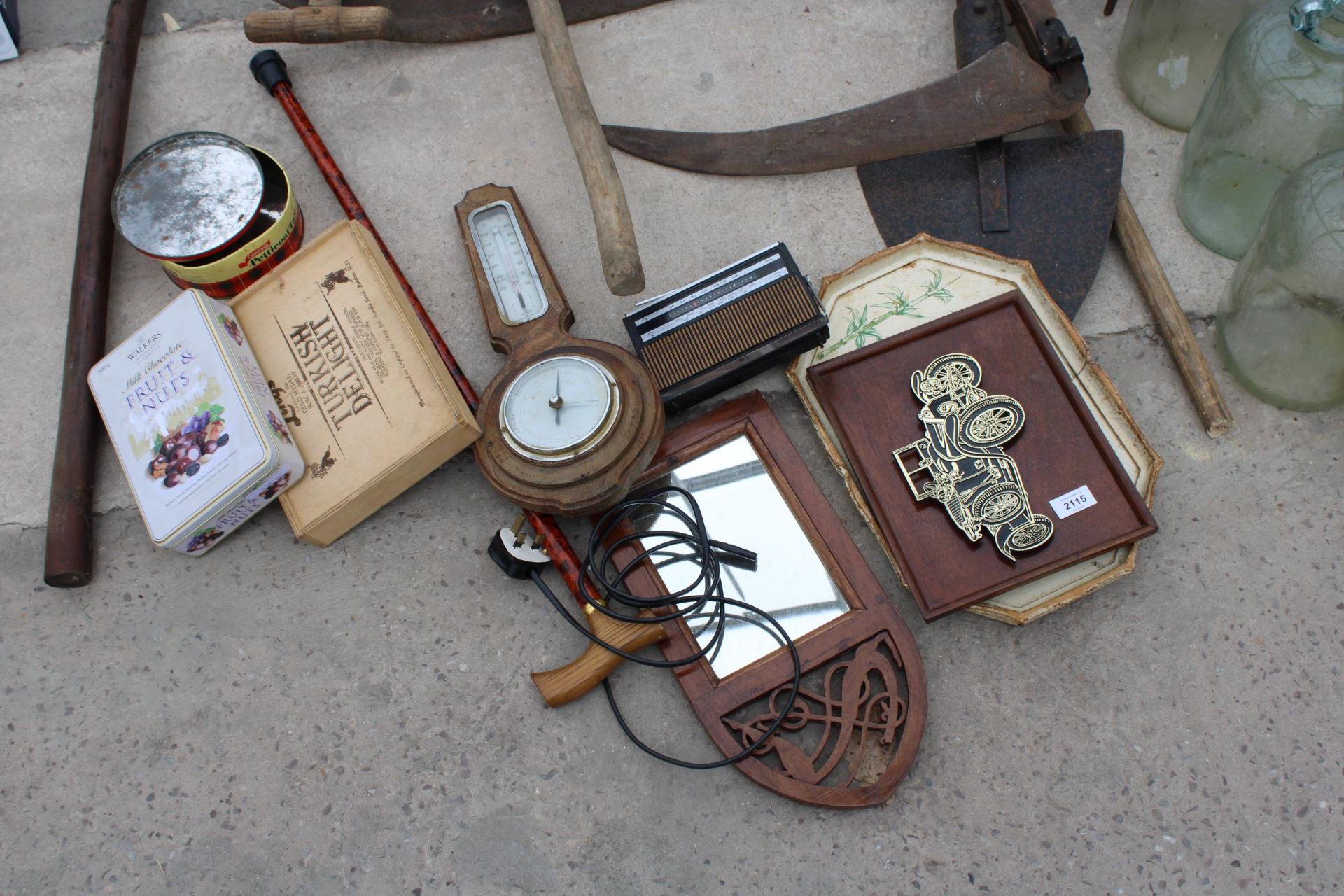 AN ASSORTMENT OF ITEMS TO INCLUDE A BAROMETER, MIRROR AND VINTAGE TINS ETC
