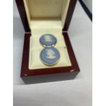 A PAIR OF BLUE WEDGWOOD JASPERWARE CUFFLINKS IN A PRESENTATION BOX