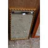 A GILT FRAMED BEVEL EDGE WALL MIRROR 26" x 16"