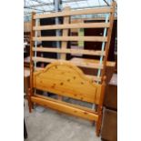 A PINE BEDSTEAD 4'6" WIDE