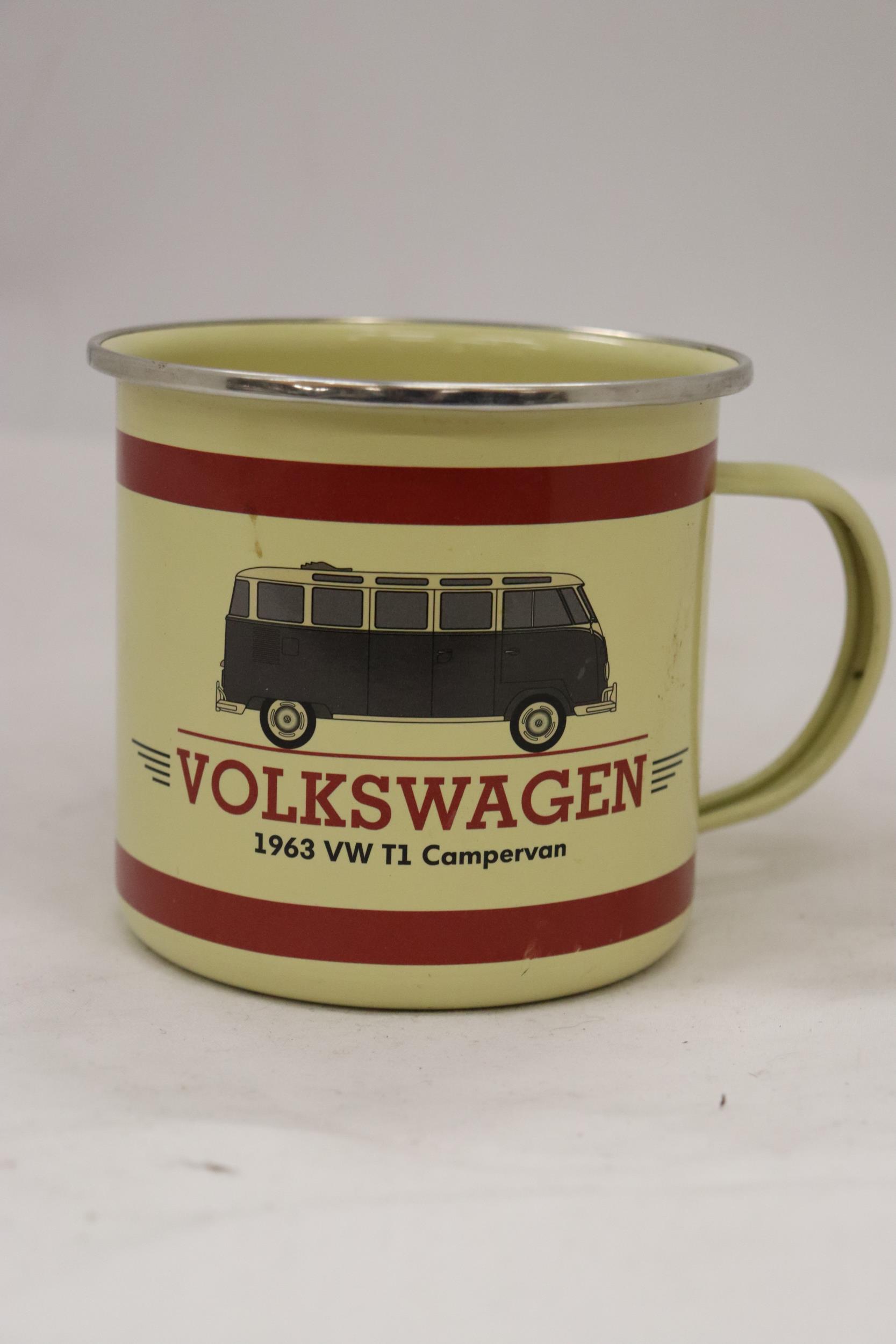 A 1963 VOLKSWAGEN ENAMEL METAL MUG