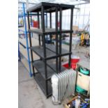 AN ELECTRIC HEATER AND TWO PLASTIC SHELVING UNITS