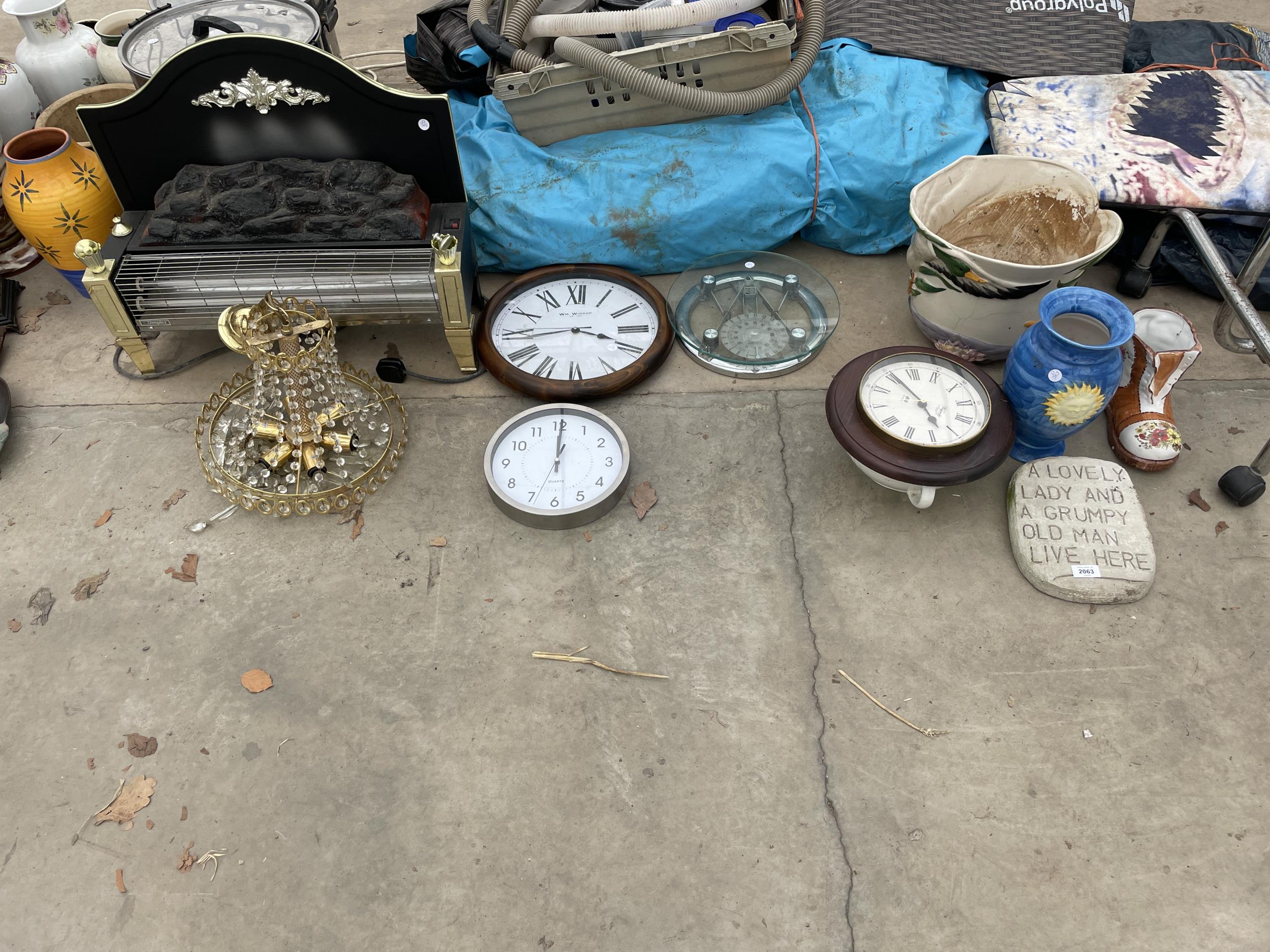 AN ASSORTMENT OF ITEMS TO INCLUDE CLOCKS AND AN ELECTRIC FIRE ETC