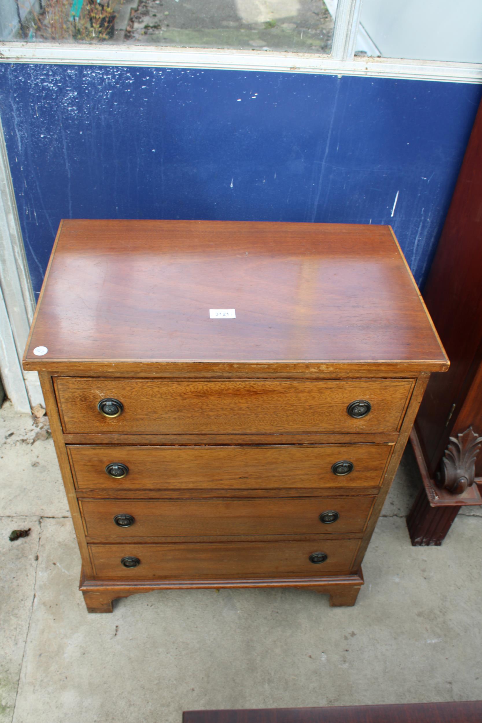 A REPRODUCTION MAHOGANY CHEST OF FOUR DRAWERS, 24" WIDE