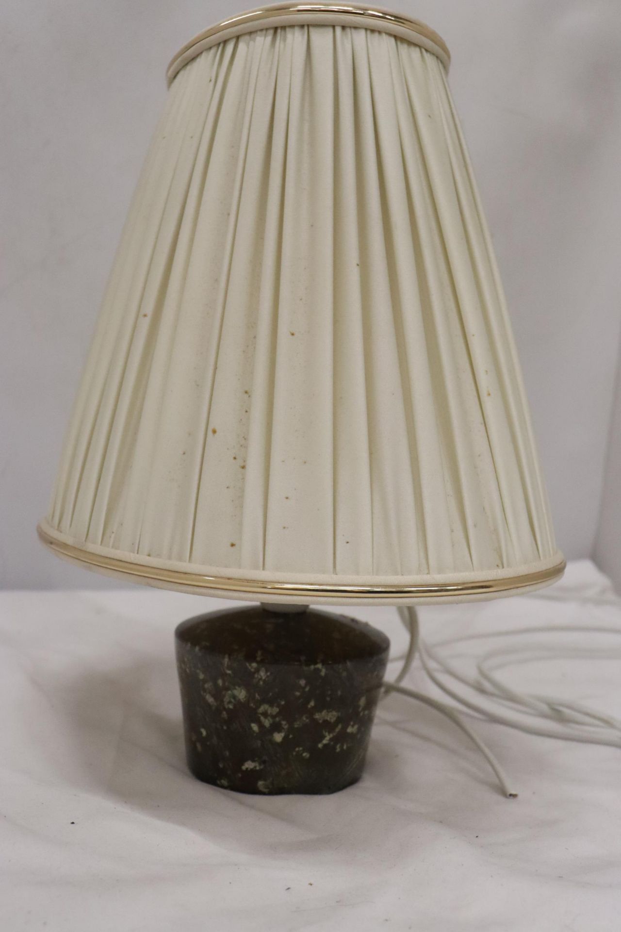 A TABLE LAMP HEIGHT 32CM BELIEVED TO BE MADE FROM CORNISH SERPENTINE FROM THE LIZARD PENINSULA
