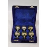 A SET OF SIX SMALL SILVER PLATED GOBLETS IN A PRESENTATION CASE