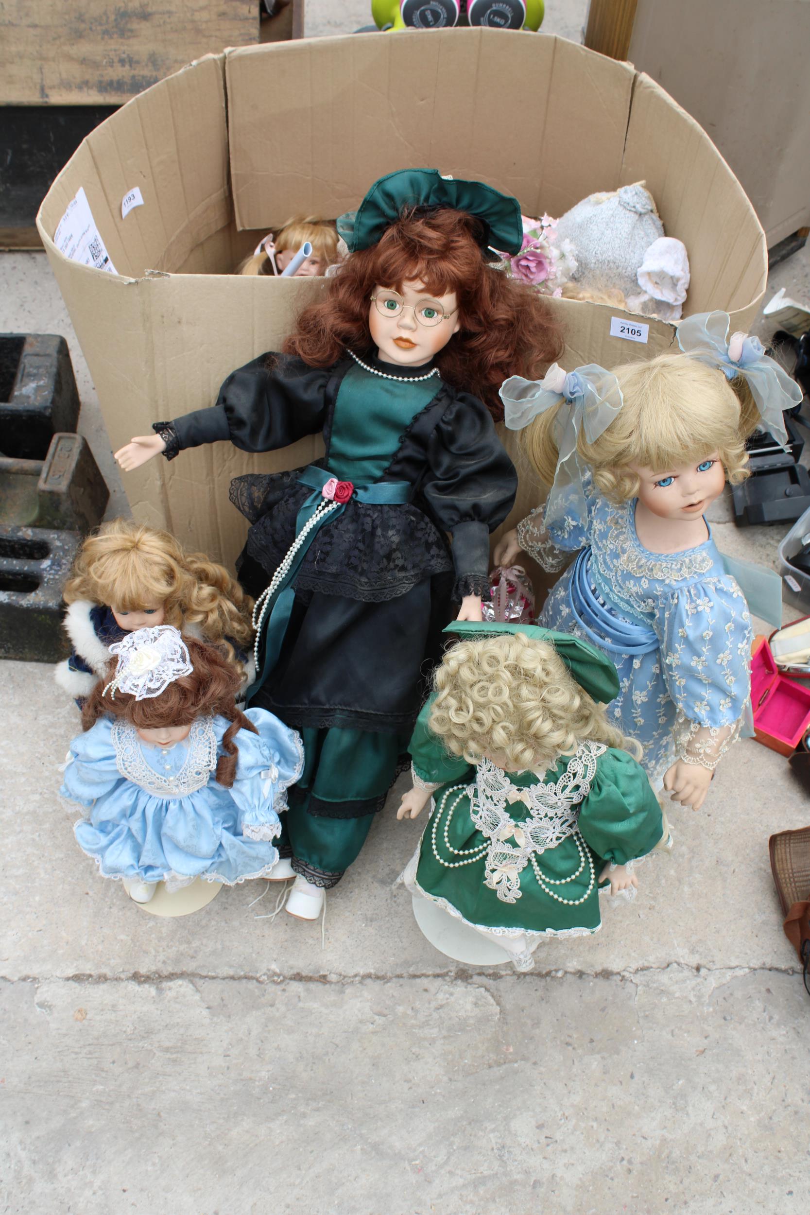 A LARGE ASSORTMENT OF CERAMIC HEADED DOLLS