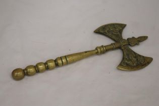 A SOLID BRASS DOUBLE SIDED BATTLE AXE