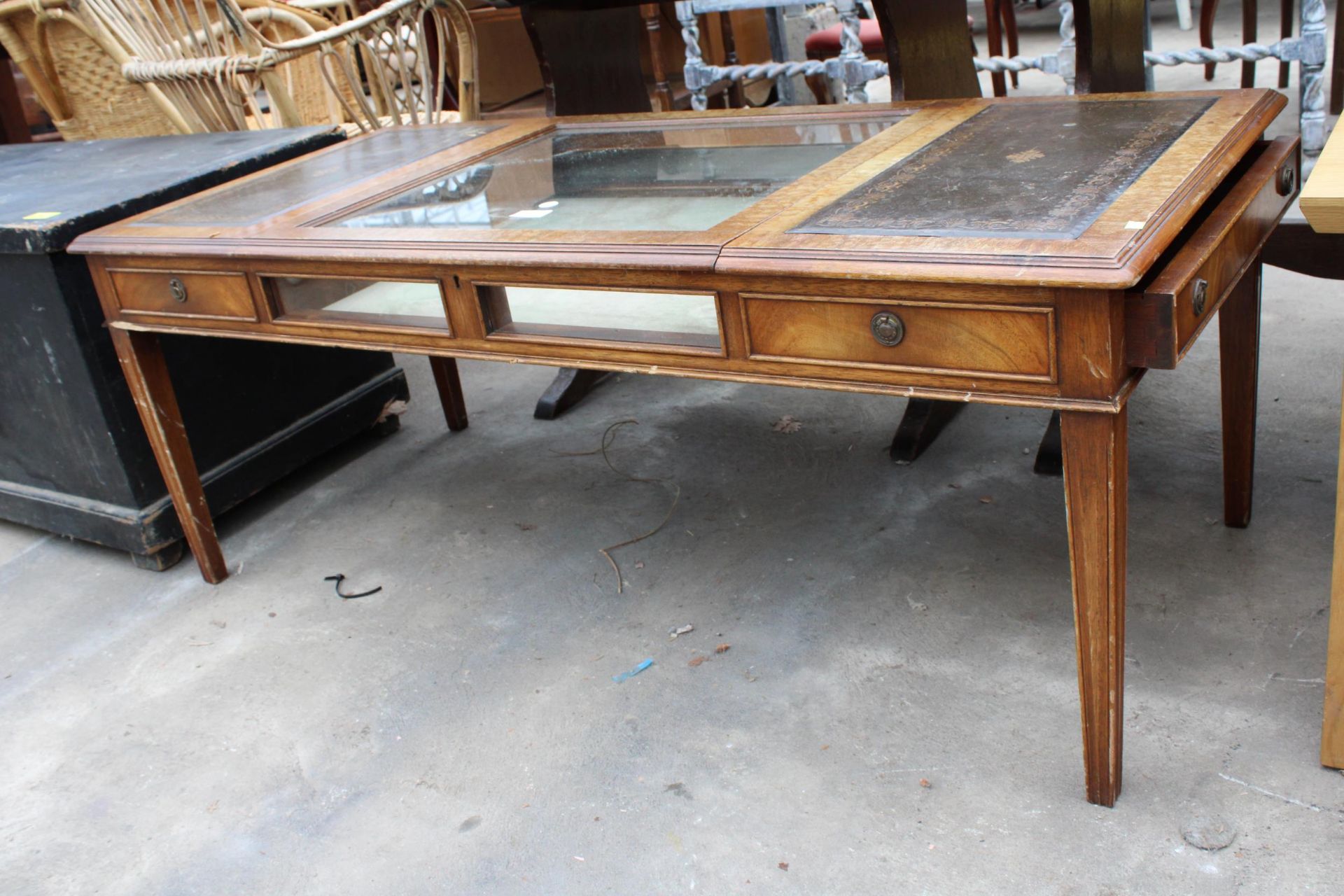 A MAHOGANY COFFEE/BIJOUTERIE TABLE WITH INSET LEATHER TOP AND TWO END DRAWERS 49" X 22" - Image 2 of 2