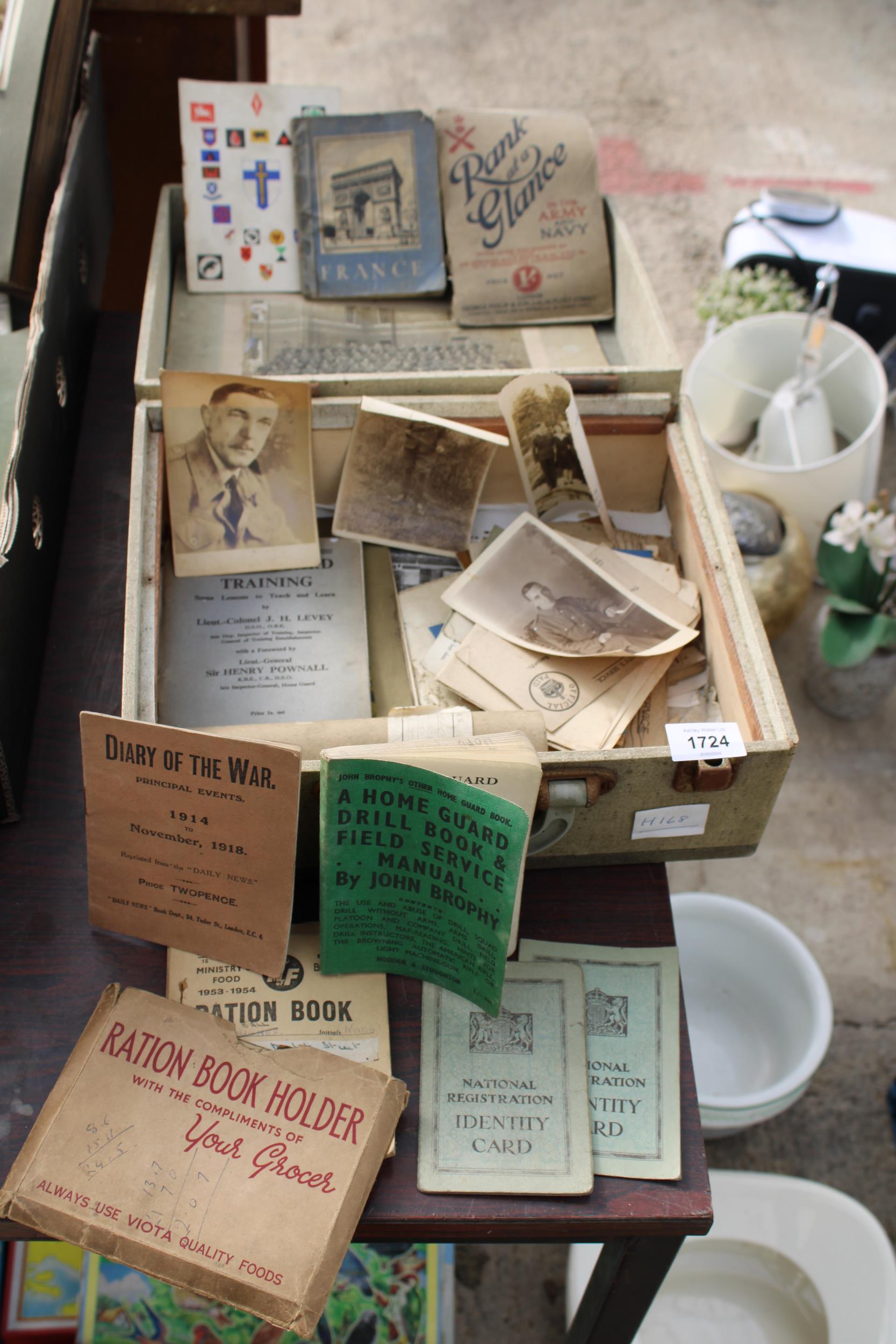 AN ASSORTMENT OF VINTAGE MILITARY EPHEMERA TO INCLUDE RATION BOOKS AND DRILL BOOKS ETC
