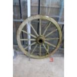 A VINTAGE WOODEN AND METAL BANDED CART WHEEL (D:120CM)