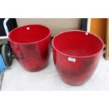 TWO DECORATIVE RED CERAMIC PLANTERS