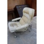 A MID 20TH CENTURY LOUNGE CHAIR IN SCAPA RYDAHOLM STYLE ON TUBULAR FRAME